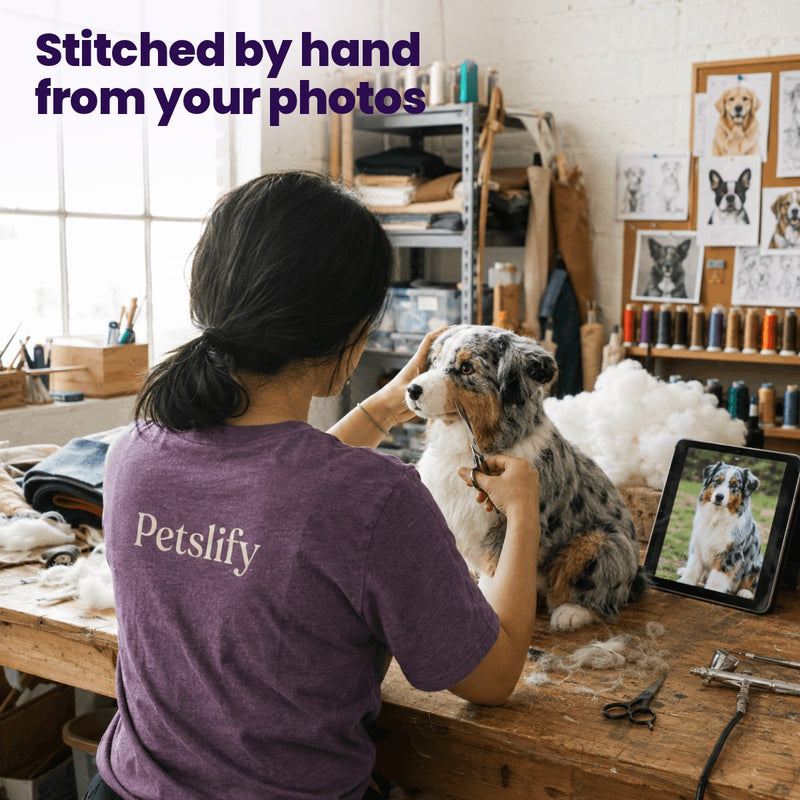 Stitched by hand from your photos: an artisan trimming a custom Australian Shepherd plush
